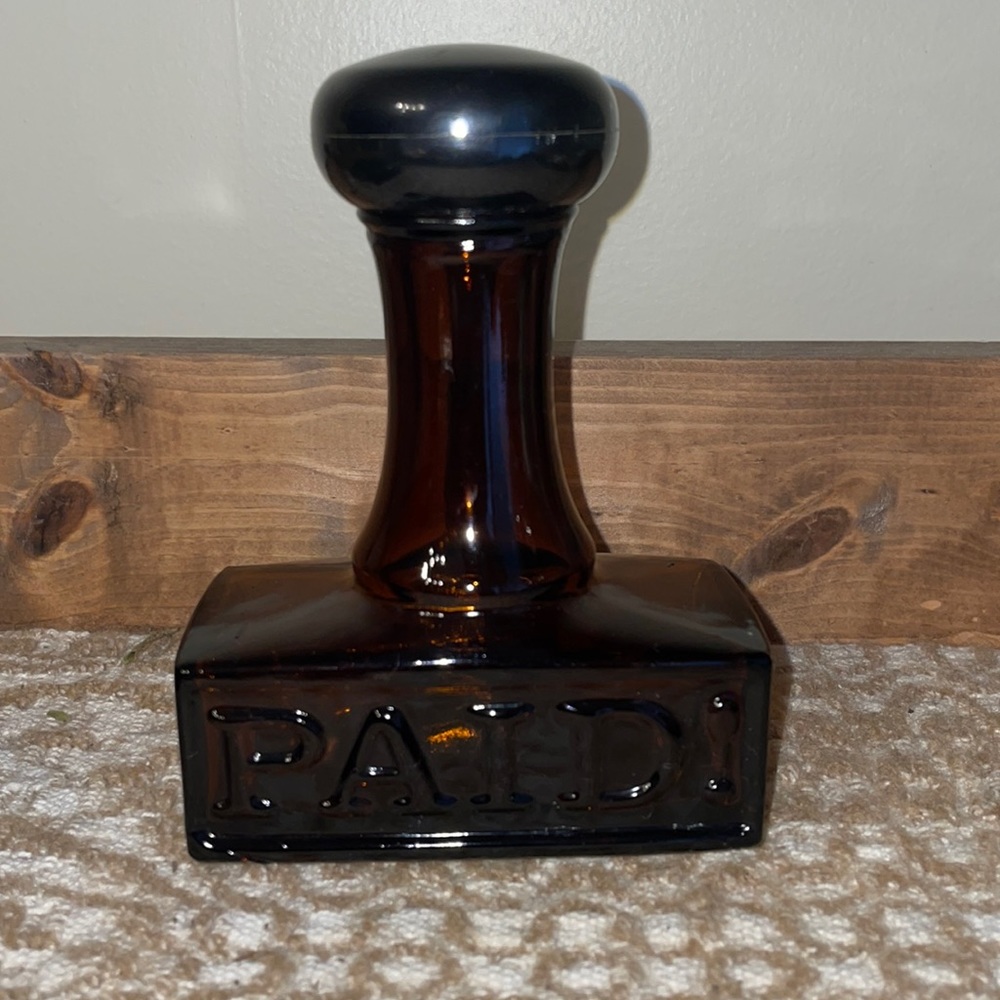 Vintage Avon “stamp” collectible cologne bottle.